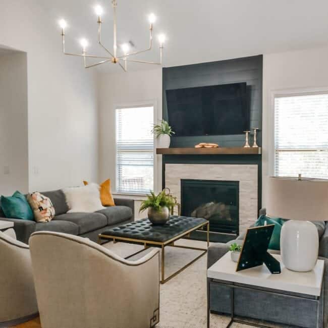 Bright, stylish family room featuring cozy furniture, decorative pillows, and contemporary accents.