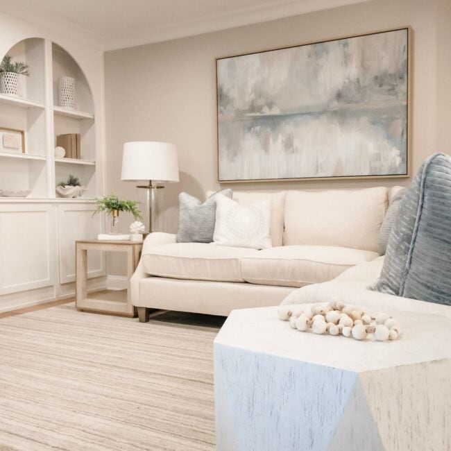 Bright, airy living room with neutral tones and coastal-inspired decor, perfect for relaxing and entertaining.