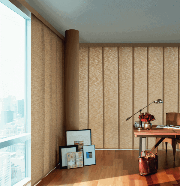 Elegant textured beige wall panels in home office.