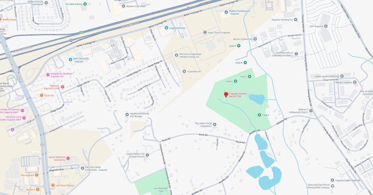 Map of Sunset Park featuring lakes and walking paths in a green space.