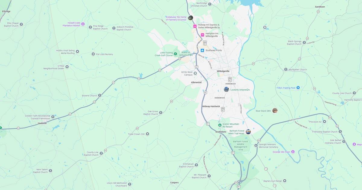 Map of the city and surrounding areas with roads and landmarks.
