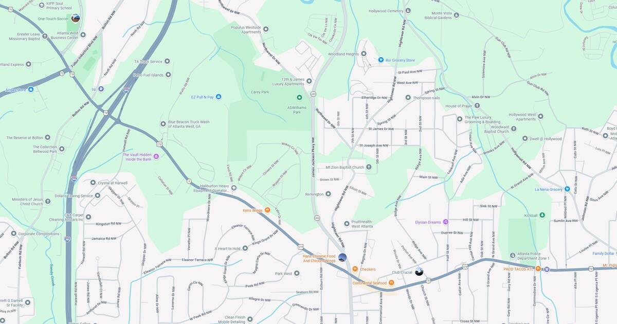 Public transportation map showing rail and bus routes in a suburban city.