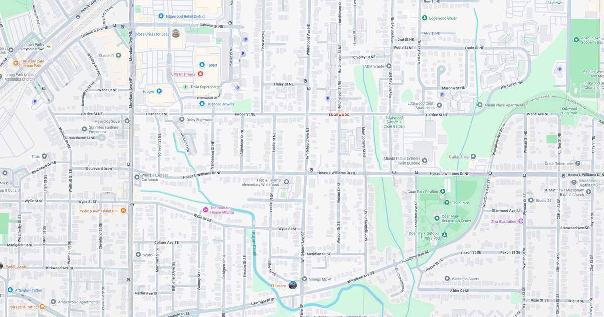 City street map showing parks, roads, and transit lines.