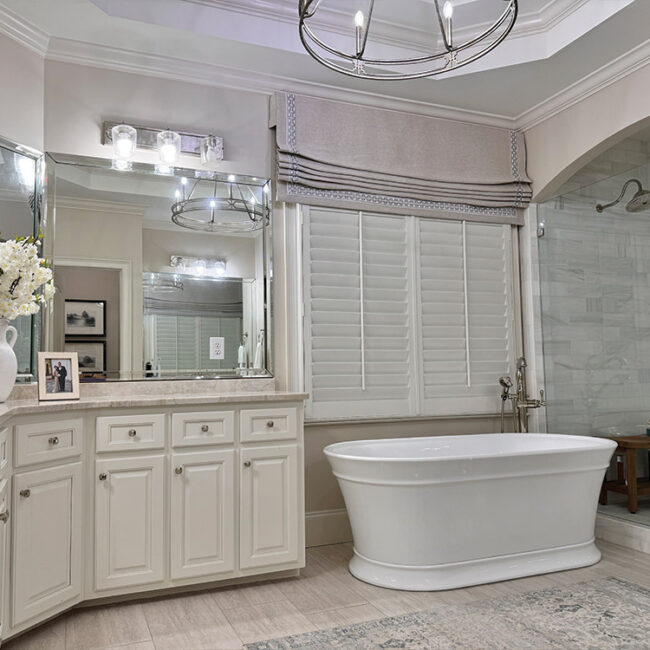 Luxurious bathroom with freestanding bathtub and walk-in shower.